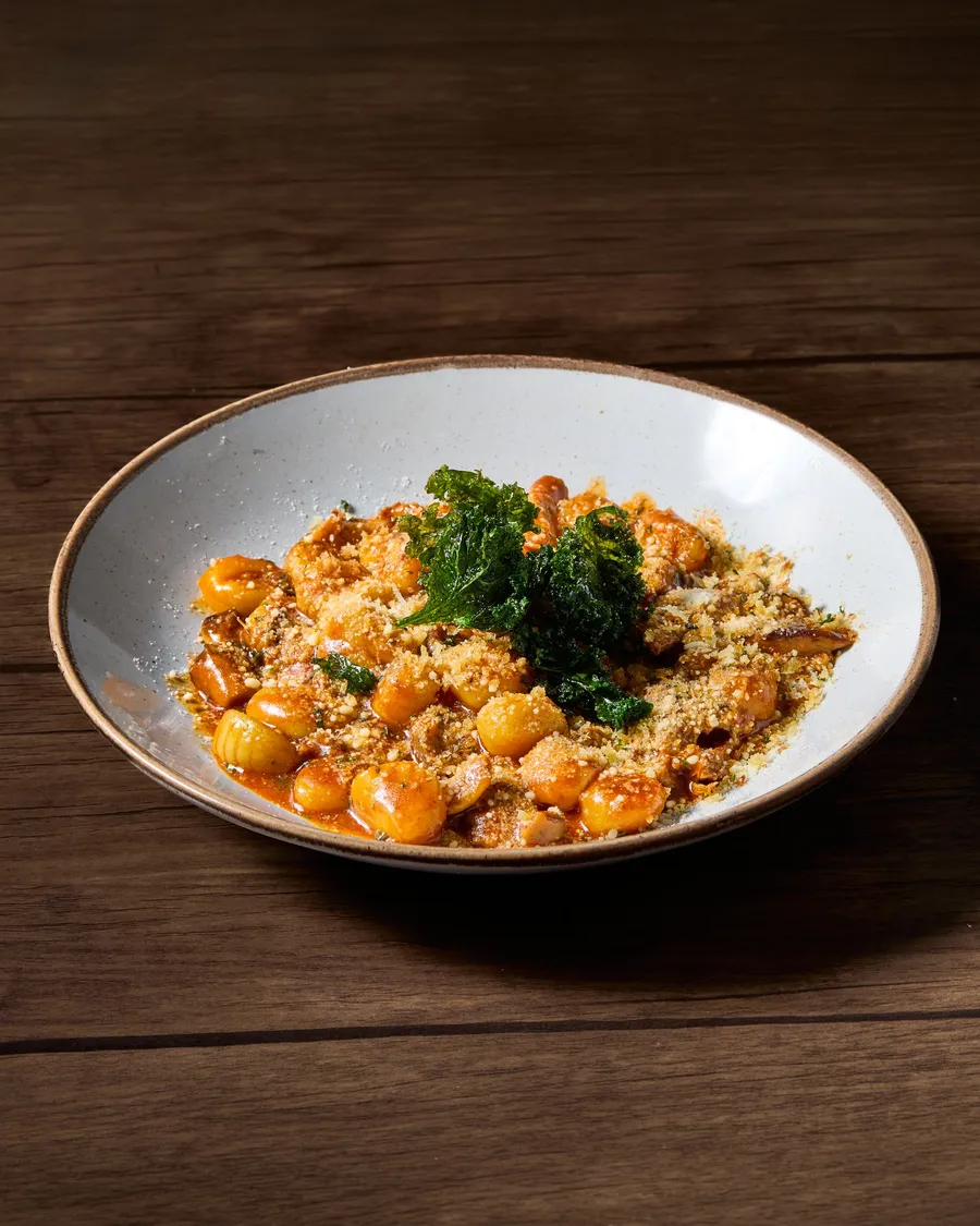 Potato gnocchi with duck and mushrooms